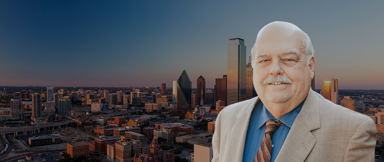 Attorney Clyde R. Parks with City Skyline in the background